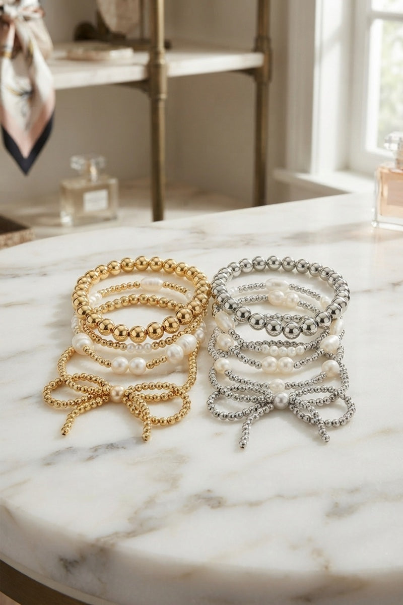 Pearl bow multi layer stretch bracelet set pack of 4